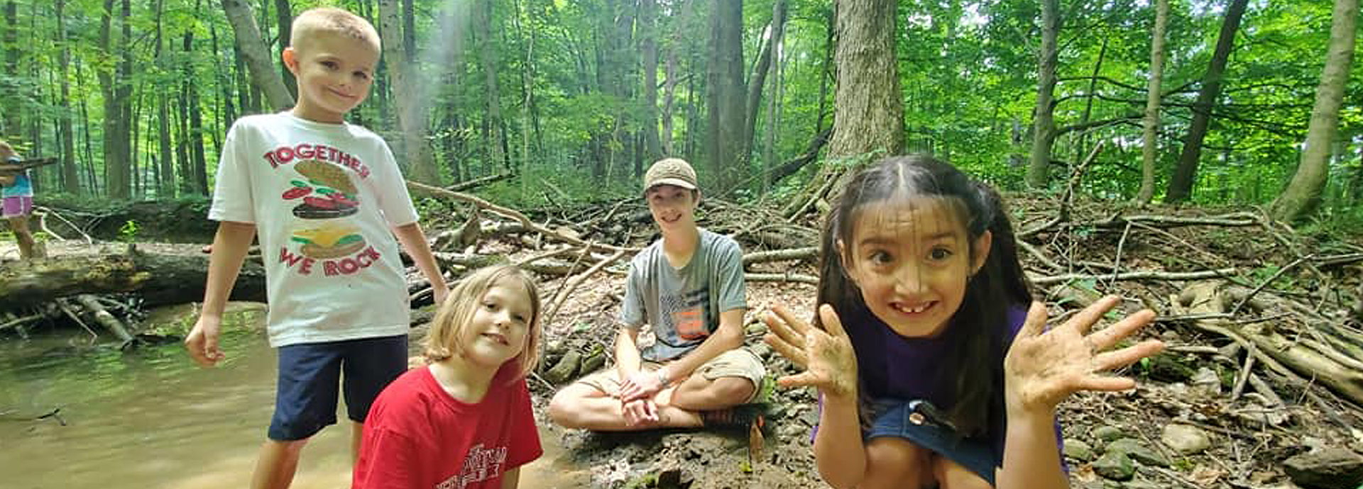 Slideshow Image - Several children playing in GNC's stream